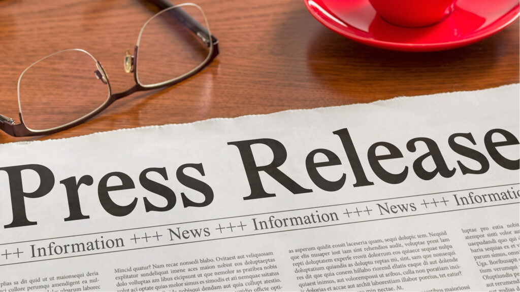 Newspaper saying press release