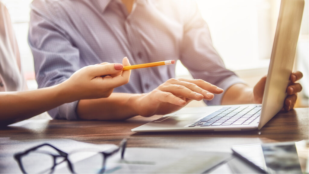 Man and woman on laptop