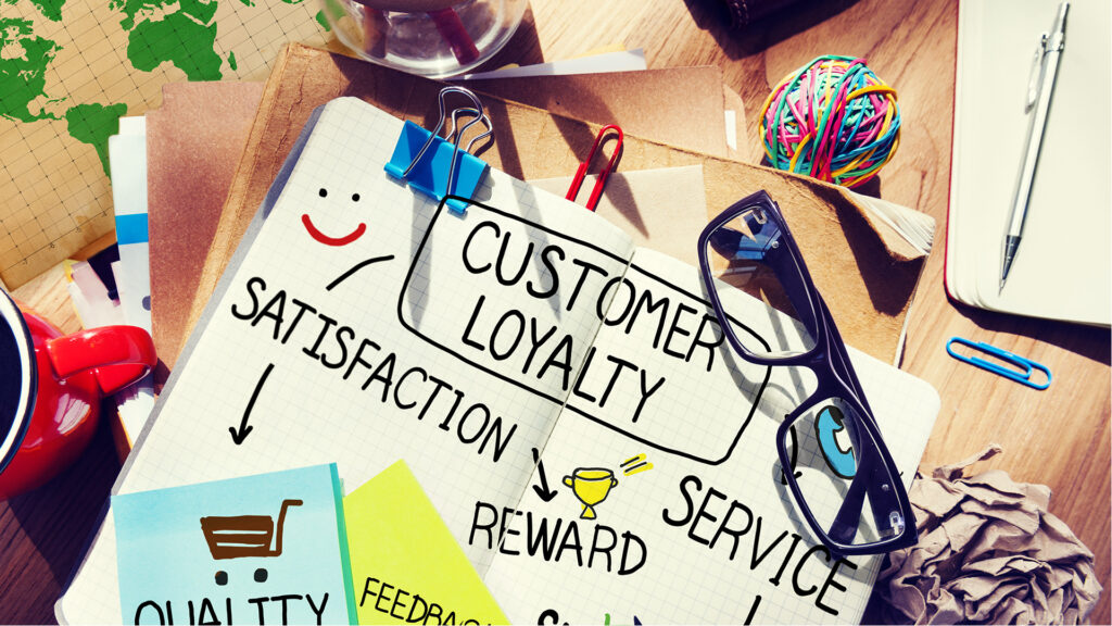 Notebook with customer loyalty written
