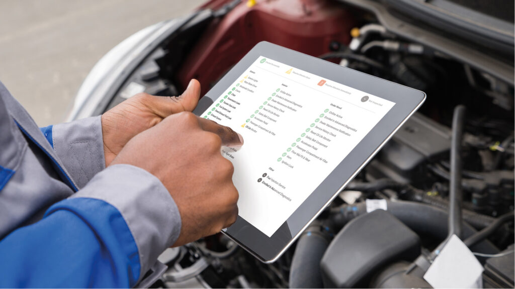 mechanic using tablet