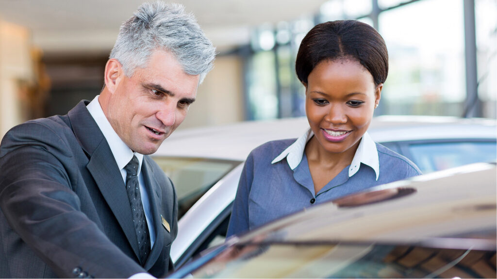 Woman shopping for a car