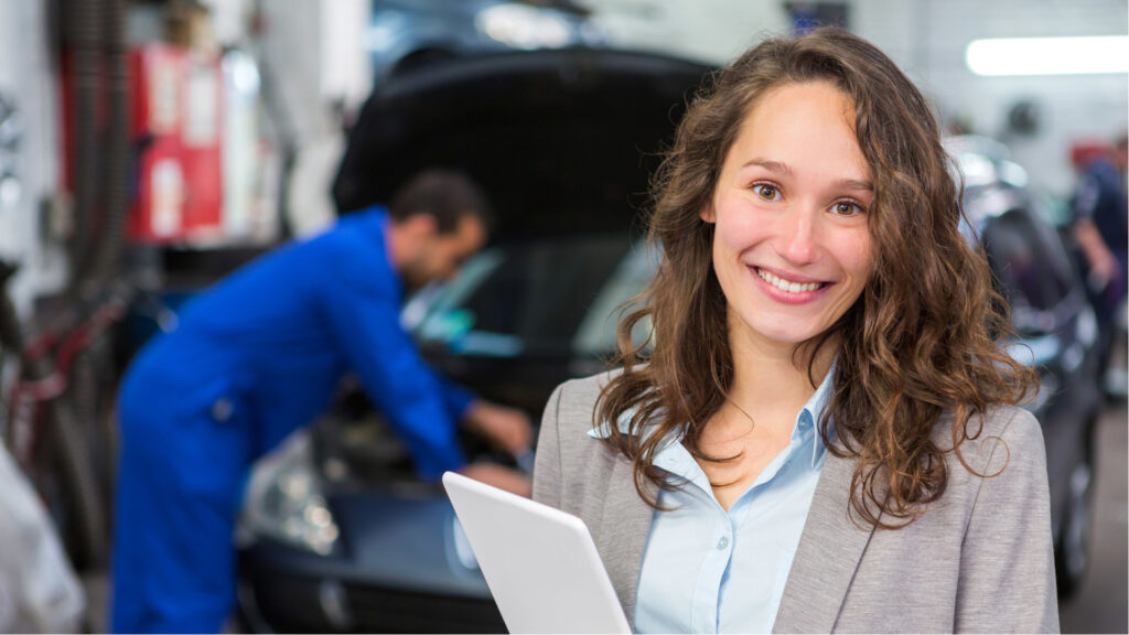 Girl in front of mechanic