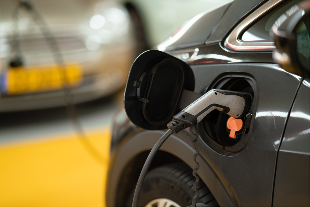 EV sales solutions represented by a charging station.