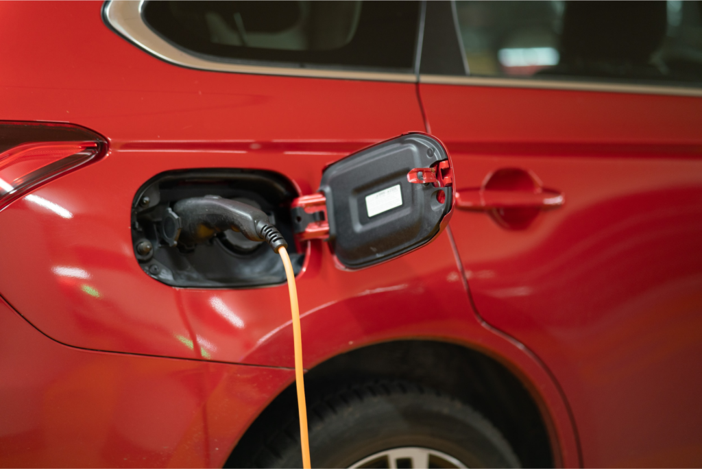 Range anxiety represented by an EV charging.